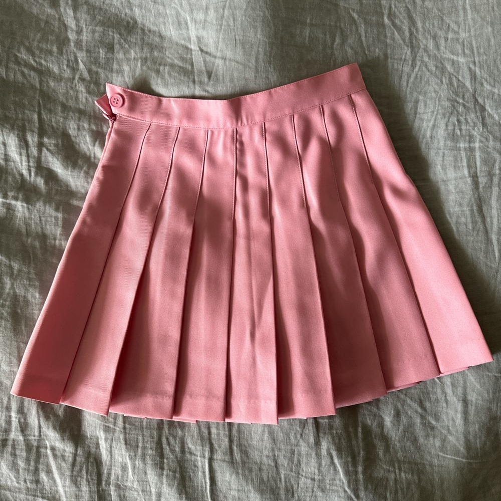 Pink pleated mini tennis skirt x American apparel 

XS